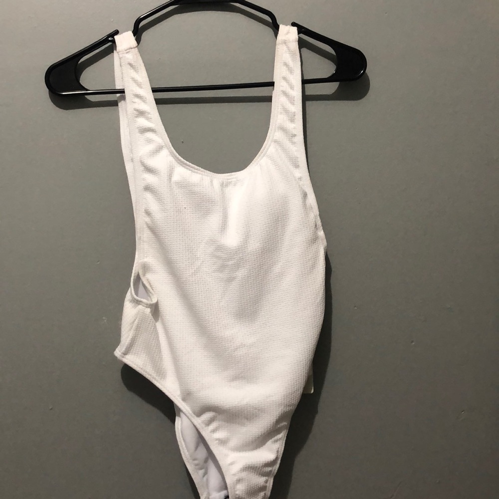 white low back one piece bathing suit